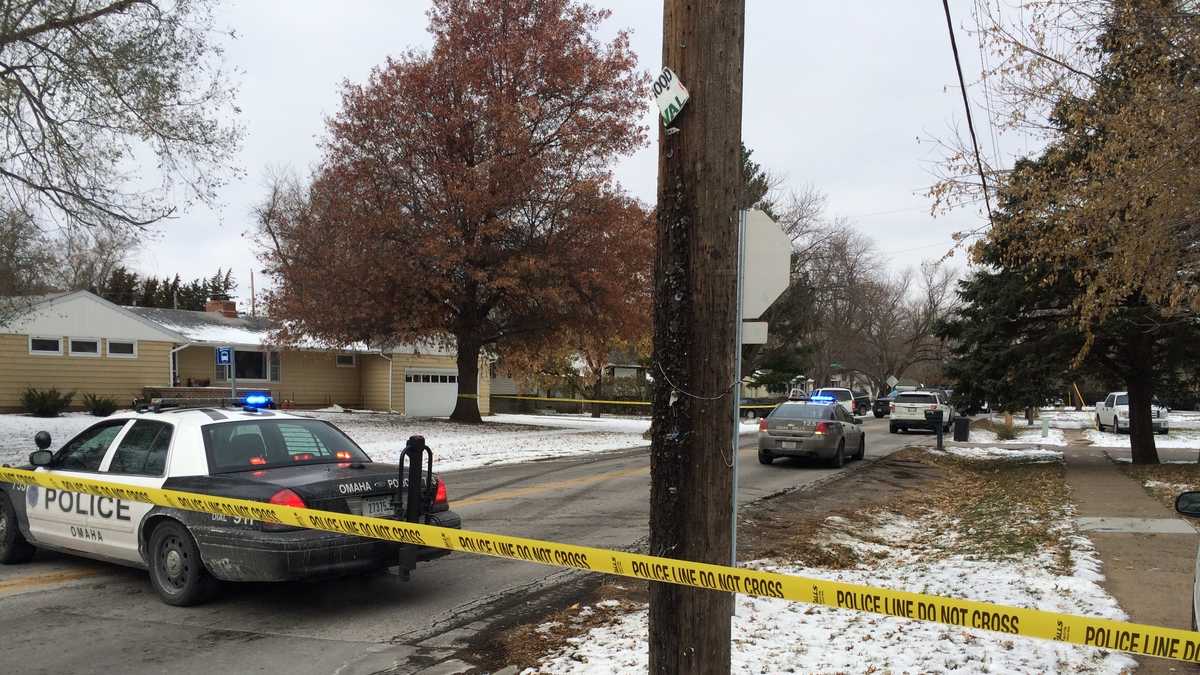 Photos: Police investigate bank robbery, shooting