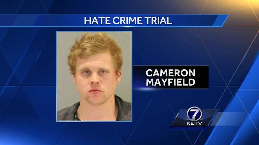 Prosecutors argue that Cameron Mayfield committed a hate crime when they say he stole the flag, set it on fire and ran back into the couple's yard.