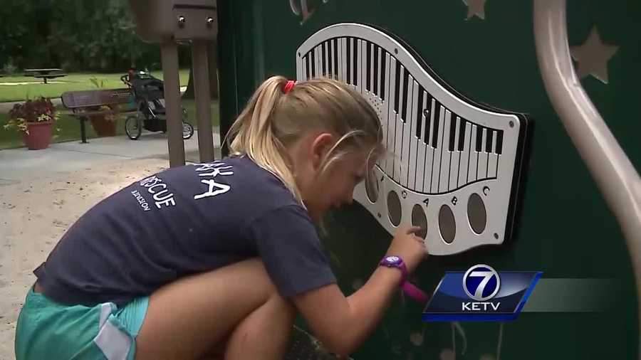 The city is showing off it's new playground equipment at Elmwood Park.