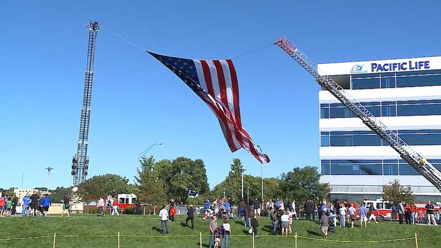 Omahans gathered at Stinson Park in Aksarben Village on Sunday morning to commemorate 9/11 terrorist attacks.
