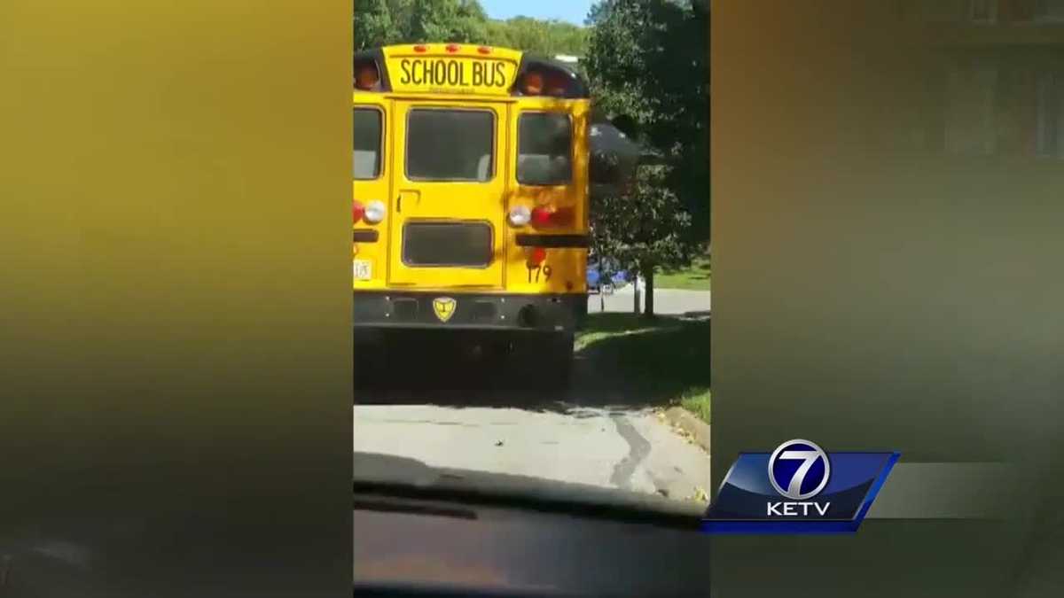 Video shows kids hanging from school bus windows