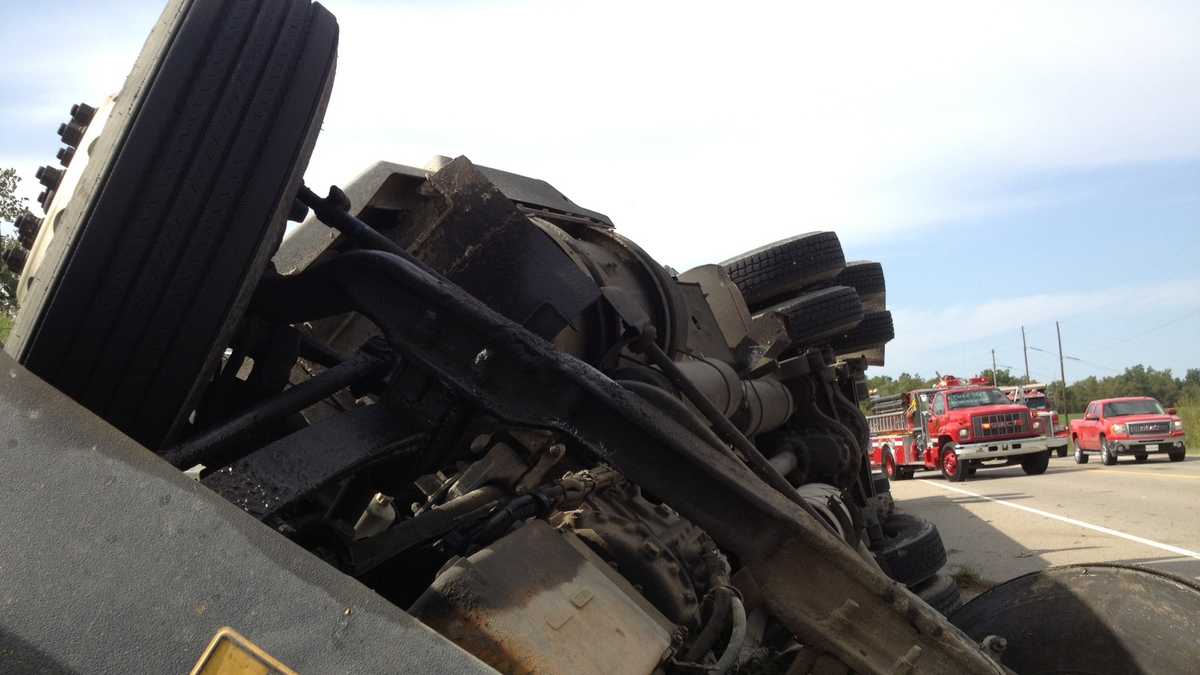 Images Truck rollover on Hwy 59