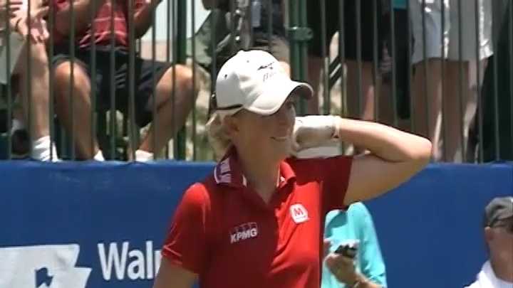 Former Razorback Stacy Lewis greets fans at the first hole during the Walmart Northwest Arkansas Championship at Pinnacle Country Club in Rogers