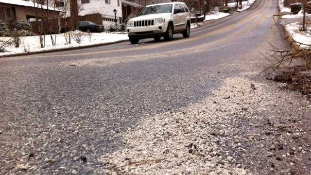 Road crews standby to treat slick spots overnight ice