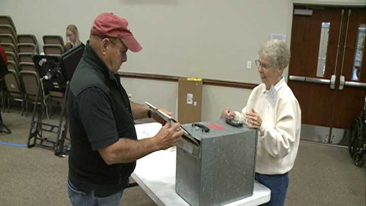 Voting at the Mt. Comfort Church of Christ in Fayetteville Tuesday morning.