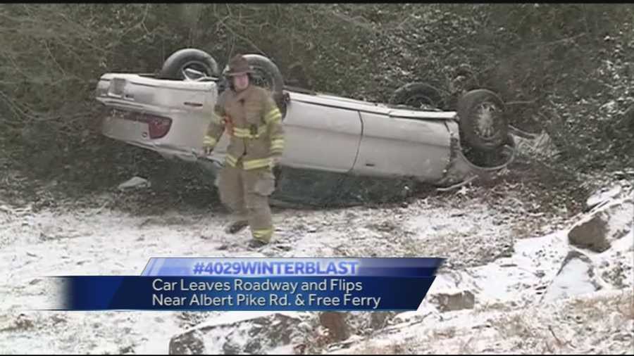 Slick roads caused this car to leave the roadway and flip into a ditch off of Albert Pike in Fort Smith