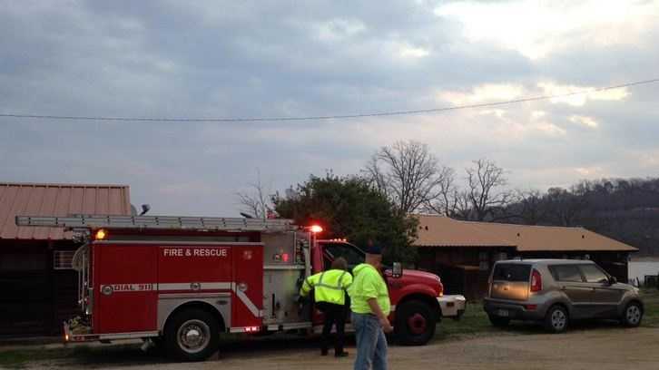 Photos: Rescuers search Beaver Lake for missing woman