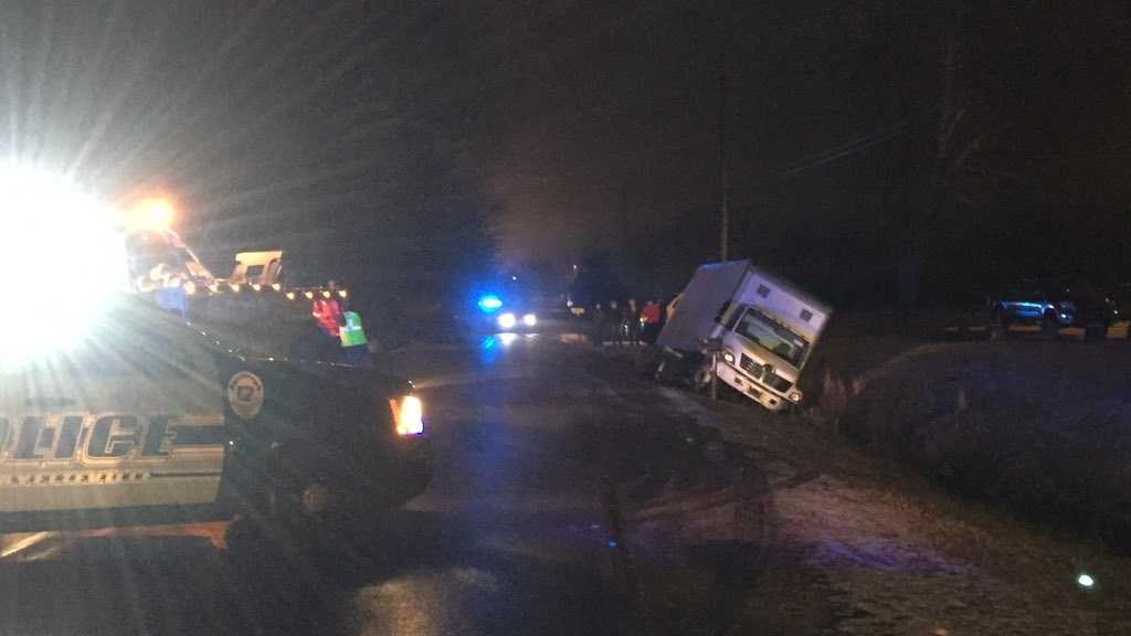 Truck runs off road, crashes into ditch