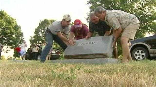 Volunteers worked to replace headstones that vandals overturned overnight at the Belton Cemetery. KMBC 9's Martin Augustine reports.