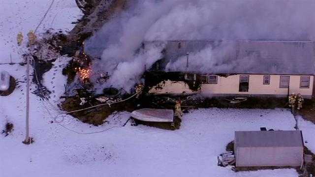 Images: Fire tears through rural home
