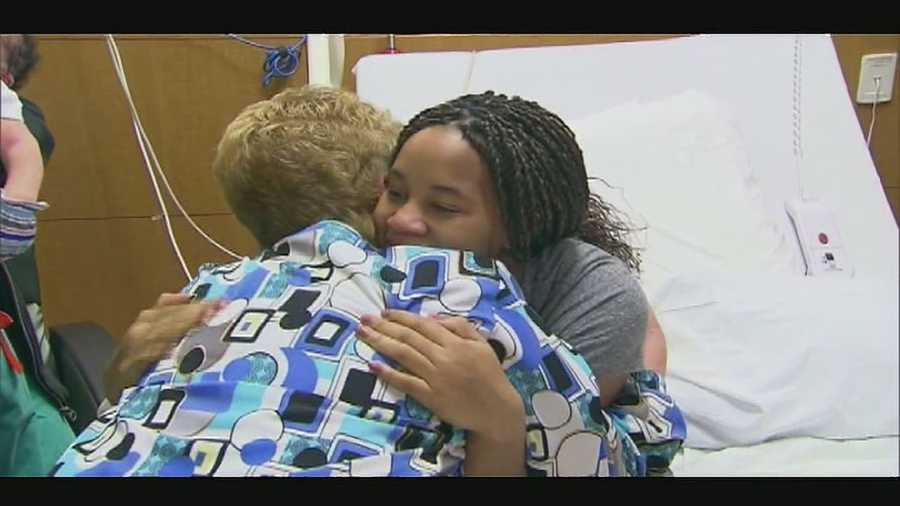 A nurse with family ties to the Kansas City area was part of a team that helped protect a patient who was in labor at Moore Medical Center when the tornado struck last Monday.