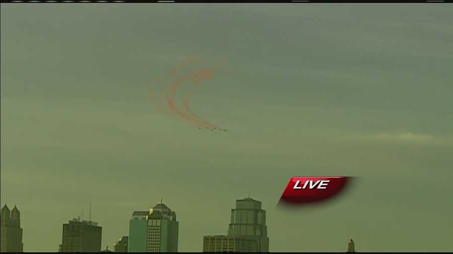 Images of planes that flew in formation over downtown Kansas City and spread red smoke to help celebrate the Kansas City Chiefs' home opener on Sunday and Red Friday.