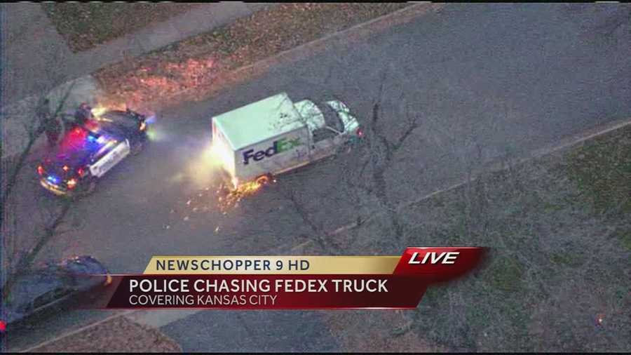 Images from a chase involving a stolen FedEx truck through the streets of Kansas City, Mo., on Wednesday evening.  Police had guns drawn on the driver at one point, but the driver drove away.  The chase finally ended when the truck's tires were blown out, and the truck could go no further.