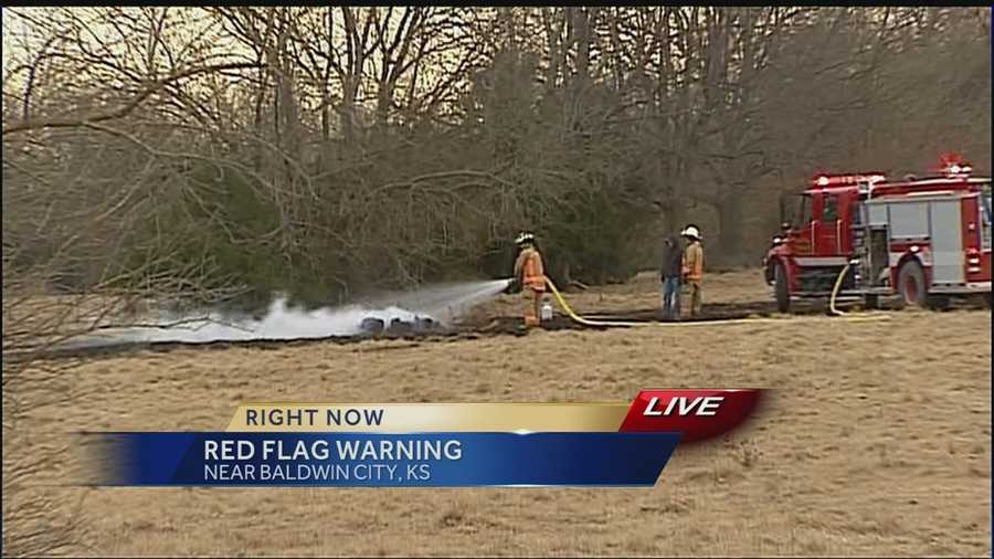 KMBC's Matt Evans reports from just north of Baldwin City, where a large brush fire burned about 50 acres.