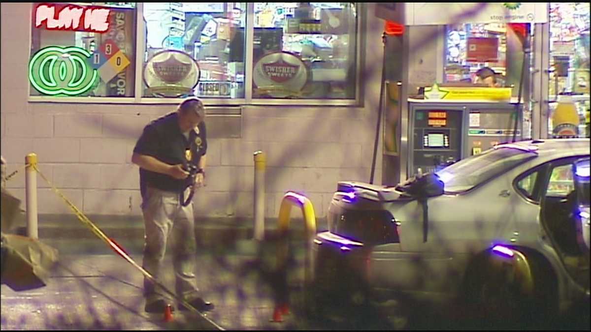 Shooting at KC gas station leaves man dead, son paralyzed