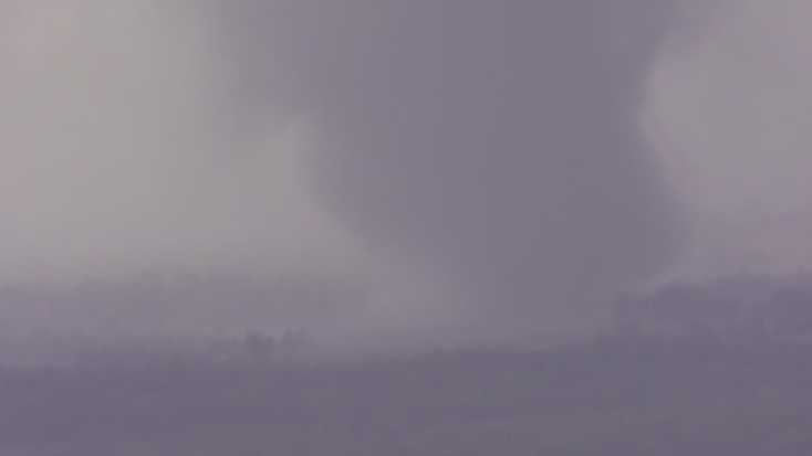 Exclusive images from KMBC's NewsChopper 9 HD of a tornado on the ground in southeast Kansas on Sunday evening.