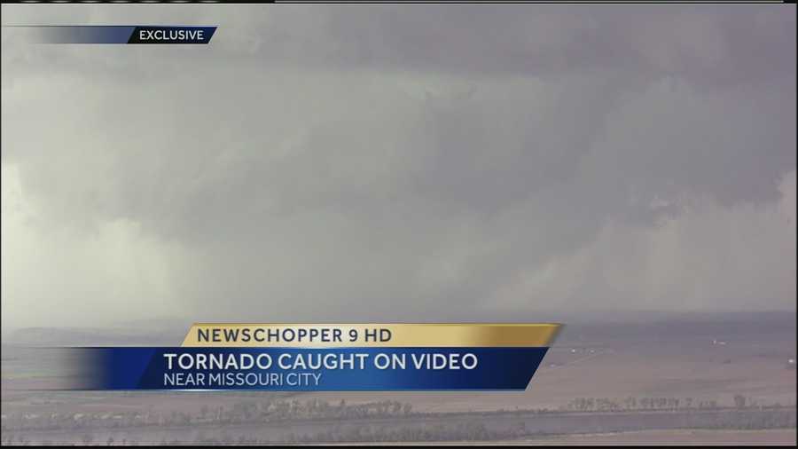 KMBC's Johnny Rowlands in NewsChopper 9 HD was there as a tornado formed in front of his chopper near Missouri City, Mo.