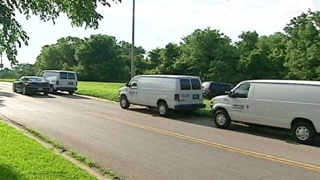 Police said they're trying to learn the identity of a set of human remains that were found in a wooded area in south Kansas City on Friday and may have been there for some time.