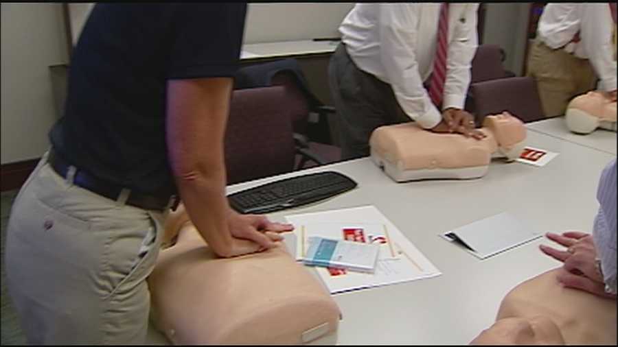 As part of an effort to train all public employees and 25,000 residents in Johnson County, members of the Johnson County Commission learn how to do hands-only CPR.