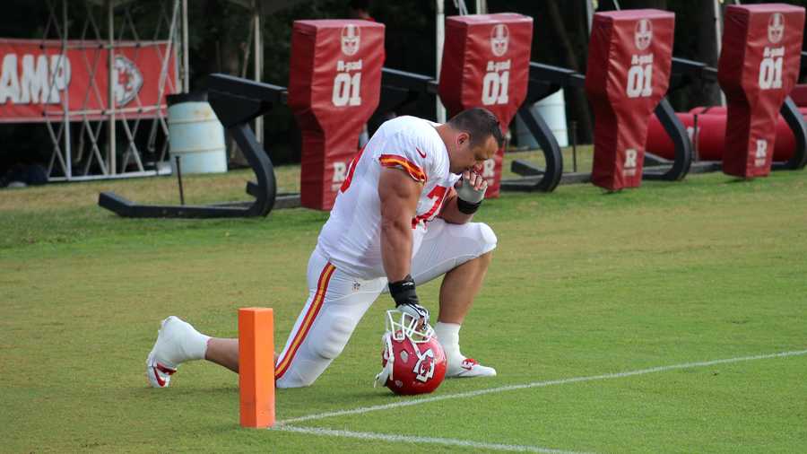 Chiefs training camp continued Wednesday morning at Missouri Western State University.  Defensive lineman Mike DeVito says a prayer before practice begins.  