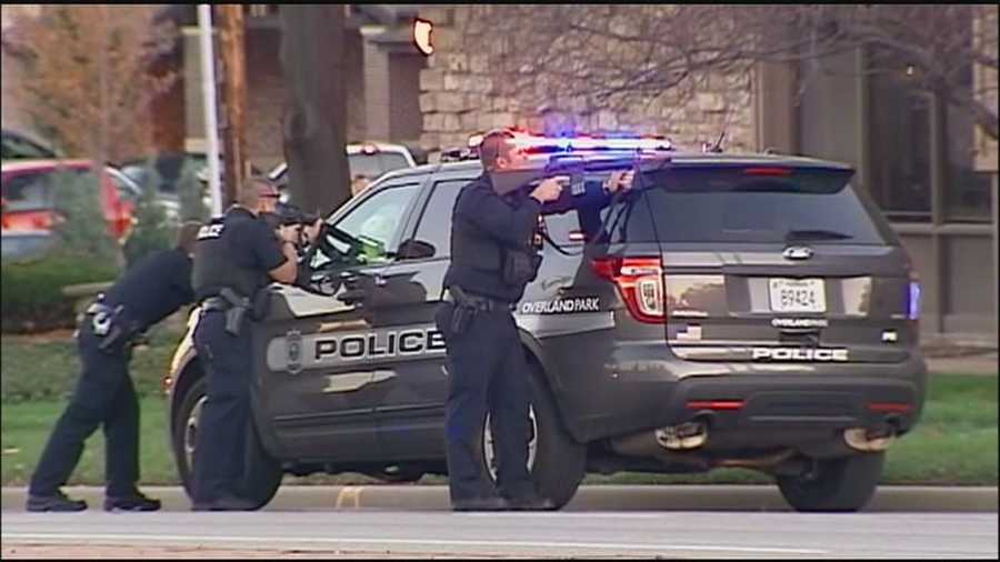Two people have been taken into custody after a robbery at a Bank of America branch at 95th Street and Mission Road in Overland Park.