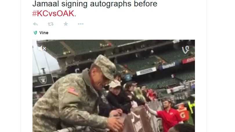 Chiefs running back Jamaal Charles signs autographs for his fans in Oakland.