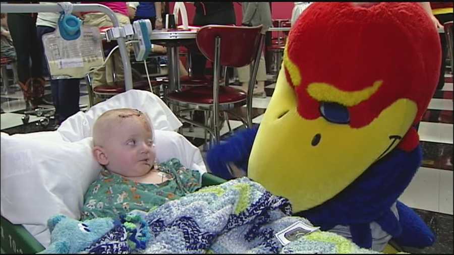 Big 12 mascots and cheerleaders visit Children's Mercy Hospital to spend some time with the young patients.