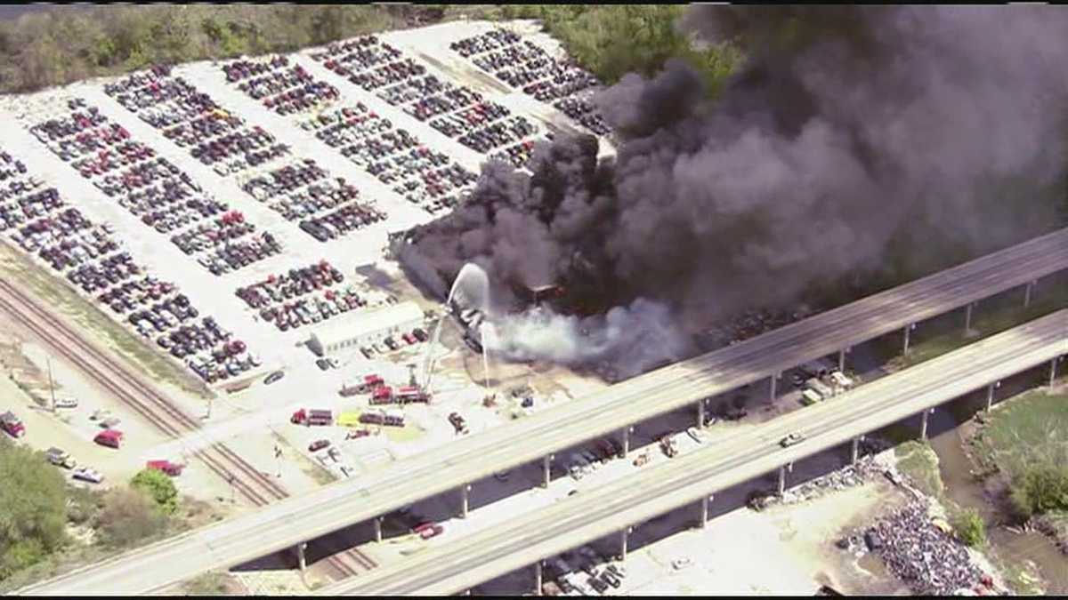 Images Fire tears through Liberty auto salvage yard