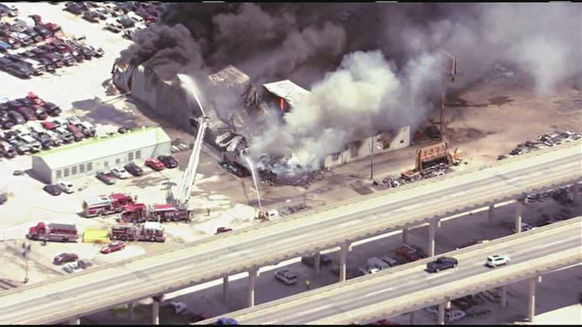 Images Fire tears through Liberty auto salvage yard