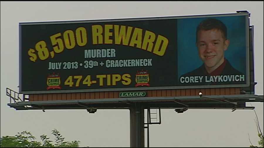 Sandwiched between ads on a busy stretch of Interstate 470 in Lee's Summit is a plea from a mother for information about her son's slaying.
