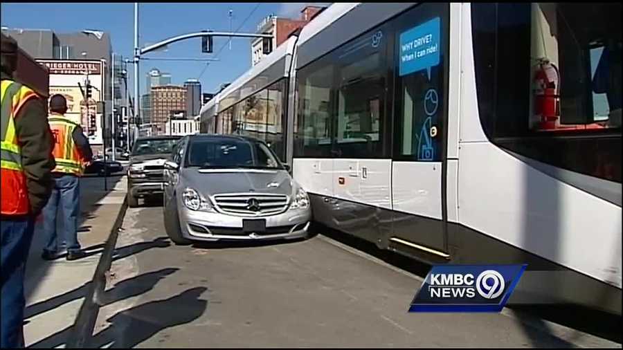 The sideswipe collision between a Kansas City streetcar and a parked car Tuesday is being blamed on a driver who illegally parked.