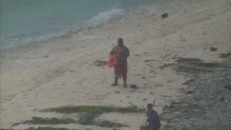 U.S. Navy rescues 3 men stranded on island