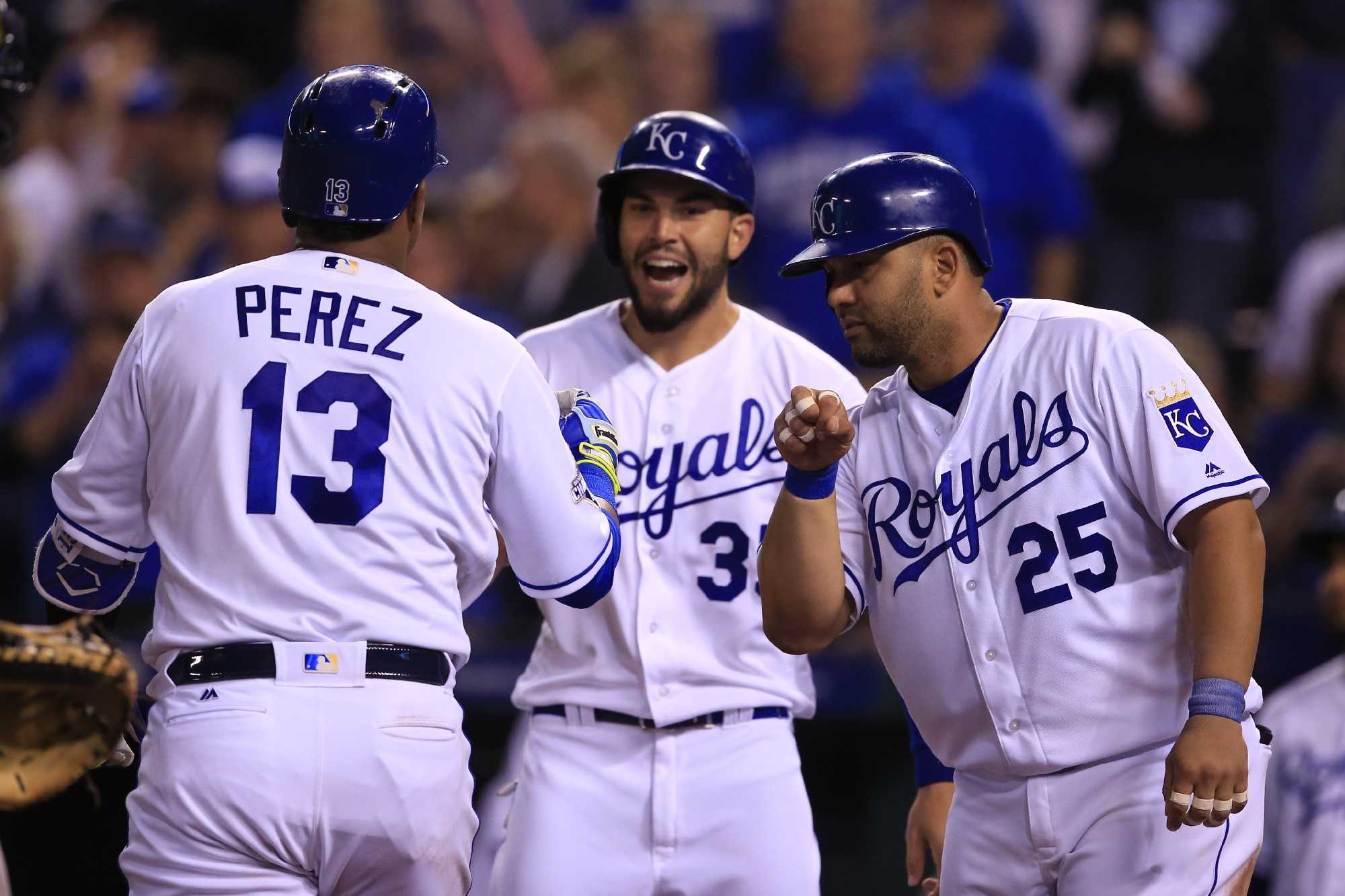 Alicedes Escobar, Salvador Perez and Eric Hosmer of the Kansas