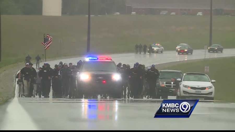 Dozens of members of the Kansas City, Kansas, Police Department and other departments from the area decide to run in full tactical gear in memory of Detective Brad Lancaster.