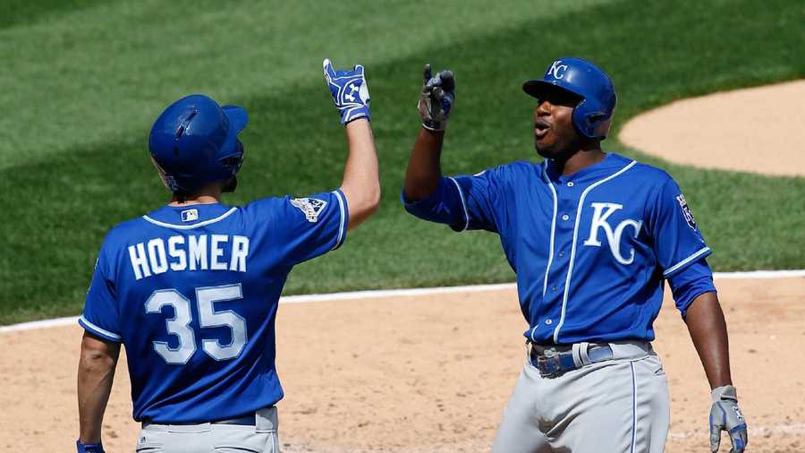 Kansas City Royals' Lorenzo Cain, right, celebrates with Eric Hosmer after hitting a solo home run during the sixth inning of a baseball game against the Chicago White Sox Saturday, May 21, 2016, in Chicago. (AP Photo/Nam Y. Huh)