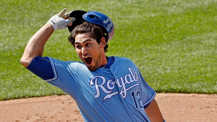 Kansas City Royals' Brett Eibner celebrates after hitting the game-winning single during the ninth inning of a baseball game against the Chicago White Sox on Saturday, May 28, 2016, in Kansas City, Mo. The Royals won 8-7. (AP Photo/Charlie Riedel)