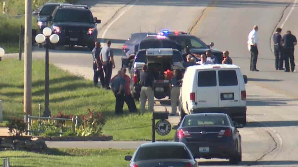 Man found dead in road was shot to death, police say