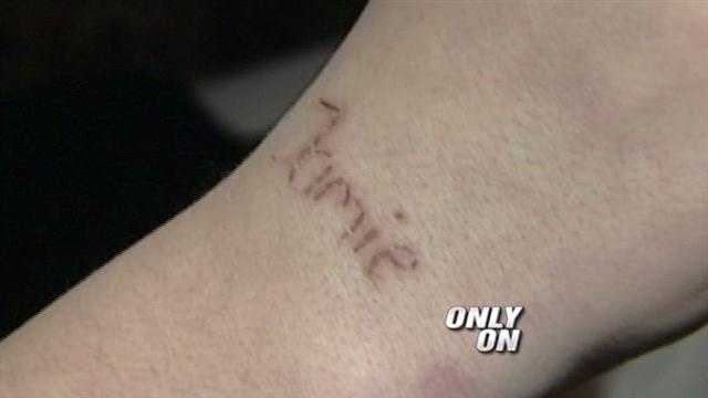 A mother is outraged after her son comes home with a tattoo that he got during school.