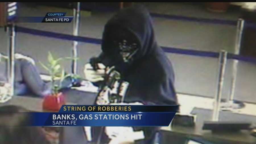 There's an 11-thousand-dollar reward for anyone who helps catch a bank robber in Santa Fe.  So far he's hit three banks.
