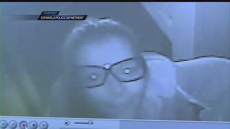 Espanola police are looking for a young woman caught on camera smashing a surveillance camera inside a local restaurant with a screwdriver.