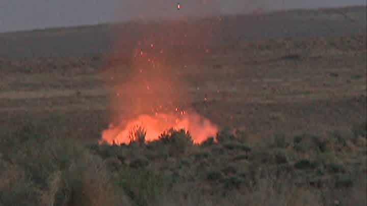 A wildfire was burning along Paseo Del Norte Wednesday night.