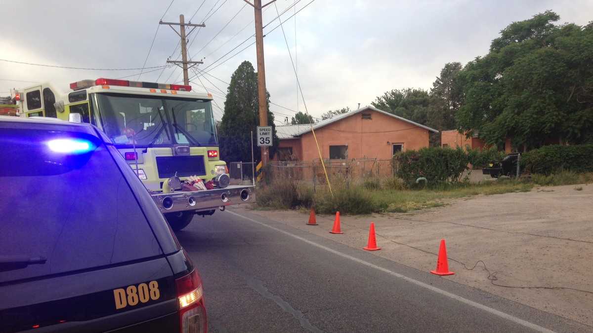 Garbage truck knocks down power lines
