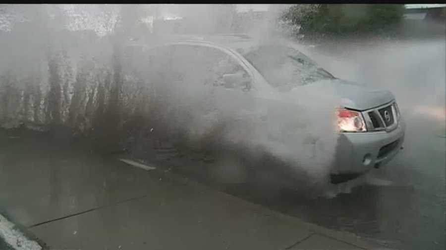 Record-breaking rain soaked Albuquerque Wednesday evening, flooding the streets and filling the arroyos.