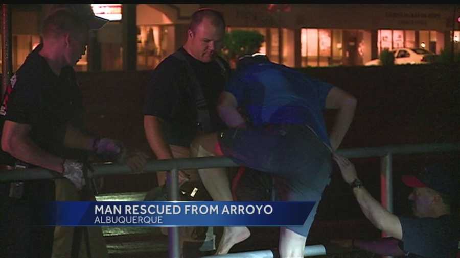Some quick heavy rain hit Albuquerque Tuesday night, which proved dangerous for one man, who had to be rescued from an arroyo.