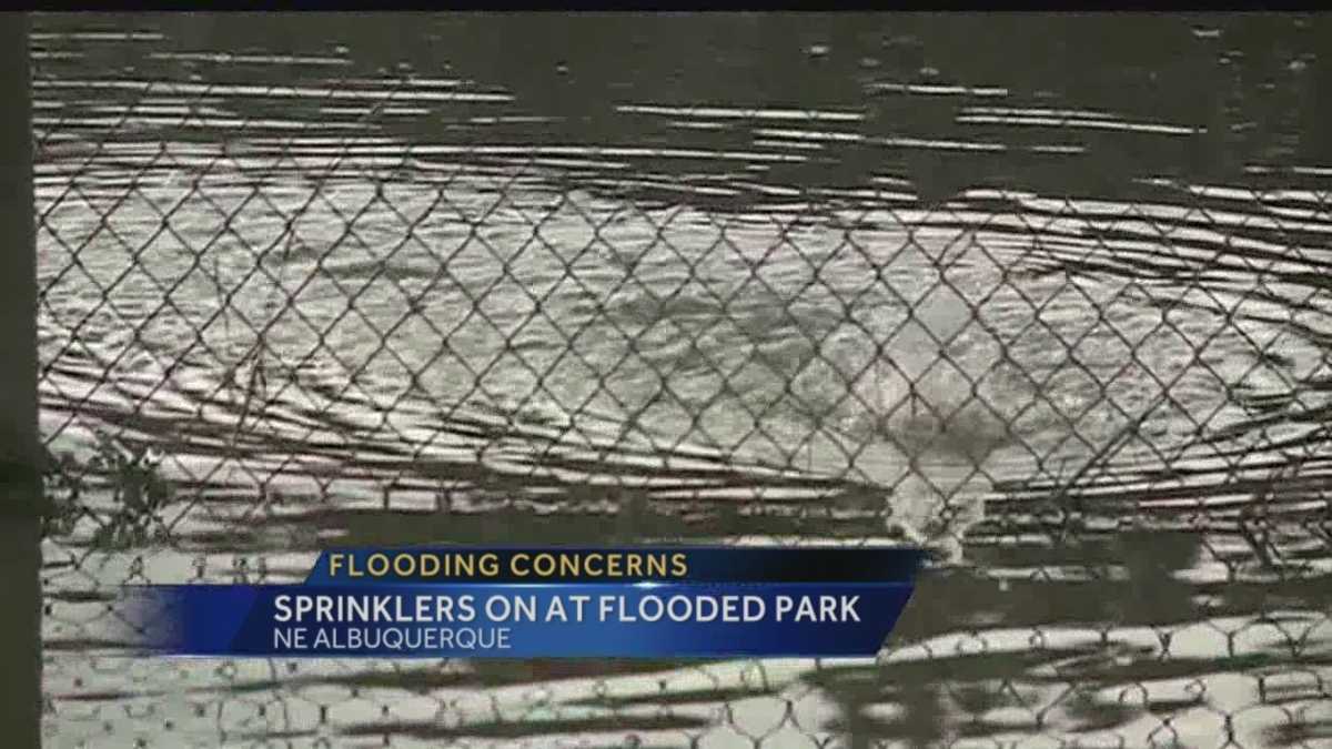 Sprinklers run at flooded Albuquerque park