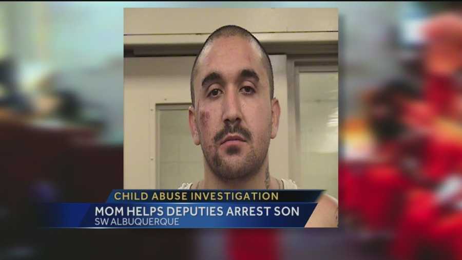 A child abuse suspect is in jail after his mother sneaked deputies into his home to arrest him.