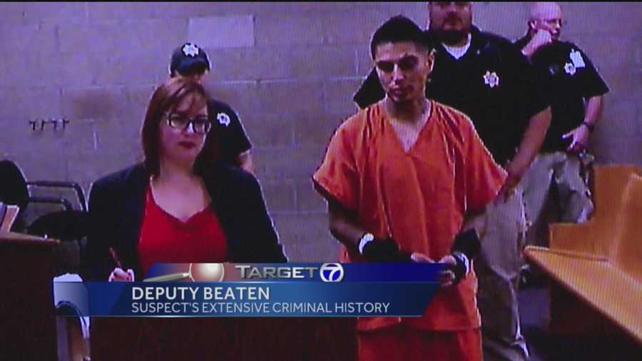 A man is accused of beating a deputy so badly she had to go to the hospital.