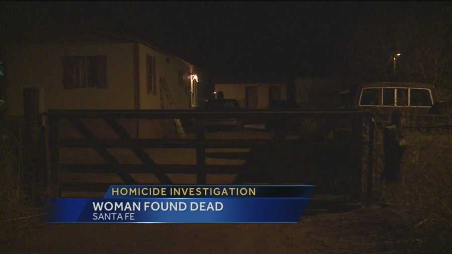 The Santa Fe Sheriff’s Office is investigating after a woman was found dead in her own backyard.