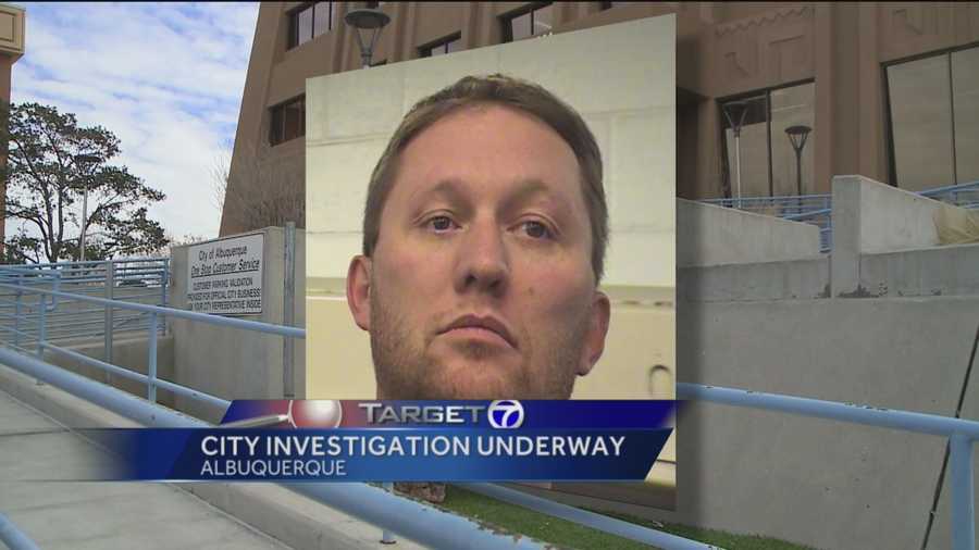 A city employee indicted for the sexual assault of a child is off the job, and the city is investigating to see if anyone helped cover for him.