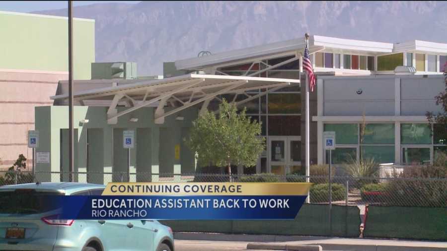 A Rio Rancho education assistant is back at work this week after being investigated for inappropriate conduct with students.
